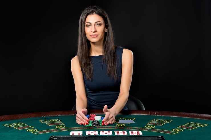 Tampilan studio Live Baccarat naga 33 dengan dealer profesional, sepatu kartu transparan, dan layar taruhan real-time